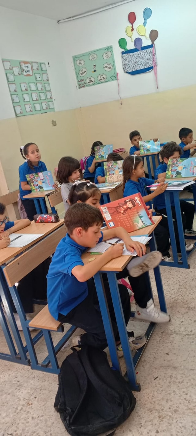 مدرسة و روضة الراية الاسلامية slide 4